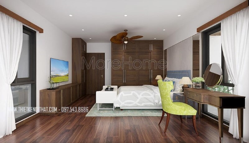 Sàn gỗ, bộ bàn ghế trang điểm, tủ quần áo, kệ tivi, cửa gỗ gỗ óc chó đã tạo nên vẻ đẹp sang trọng, độc đáo trong phong cách hiện đại tại phòng ngủ vợ chồng mặc dù với phong cách này đồ nội thất gỗ công nghiệp thường là lựa chọn phổ biến. Thiết kế nội thất phòng ngủ biệt thự